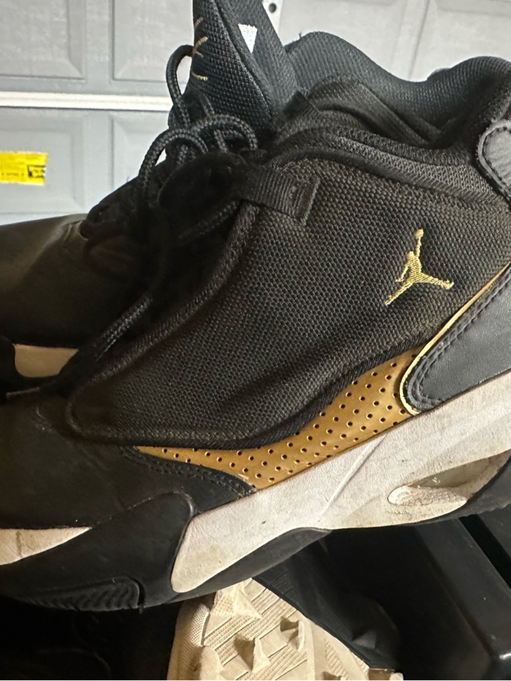 Jordan Kids Black and Gold Jumpman Sneakers